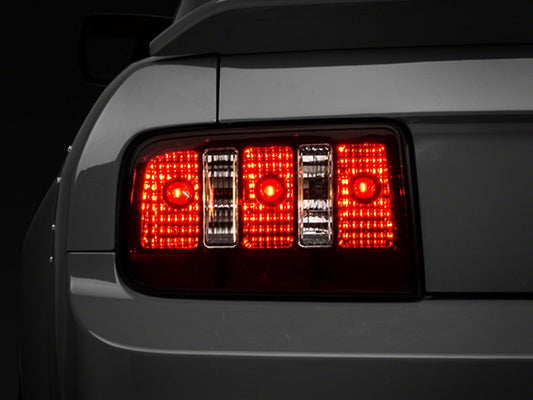 Raxiom Coyote Tail Lights; Black Housing; Smoked Lens