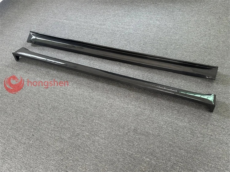 A pair of high-quality top style 3K carbon fiber side skirts for Tesla