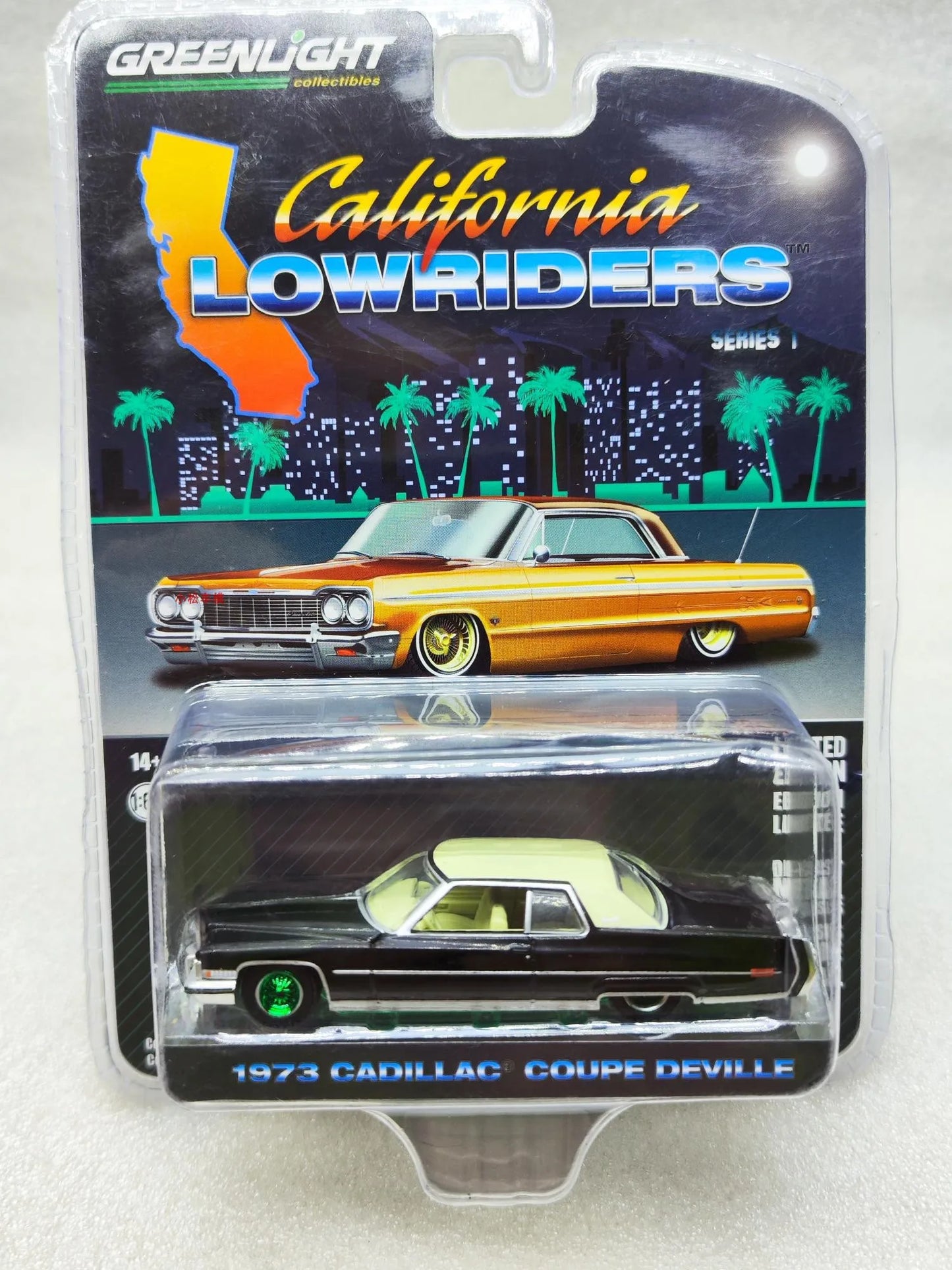 1: 64 1973 Cadillac Coupe DeVille black and gold wheel green machine