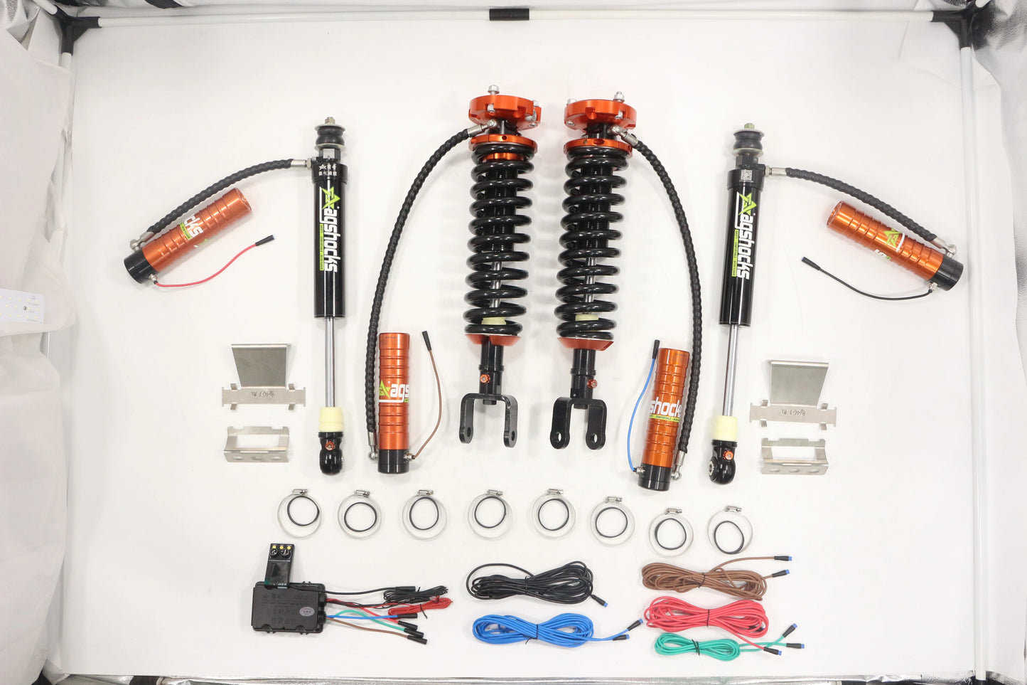 4x4 compression and/or adjustable gas coil over suspension lift kit